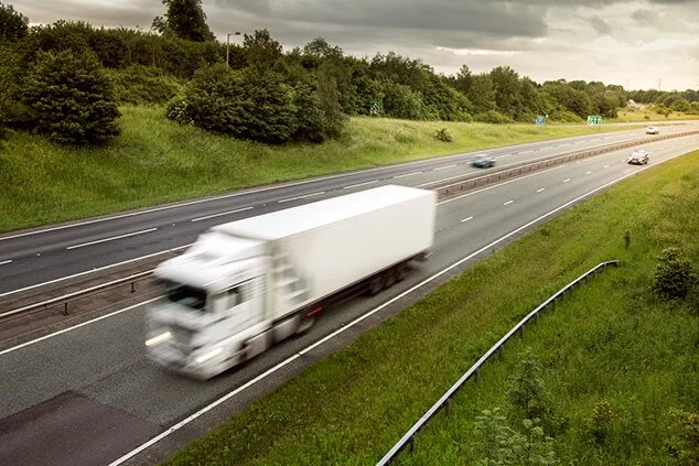 Lorry Driving down a Dual Carriageway